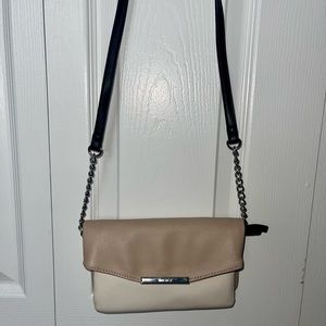 beautiful crossbody bag also can take the strap off and be a clutch